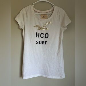 Hollister White Short Sleeve Tee with Gold and Navy Accents